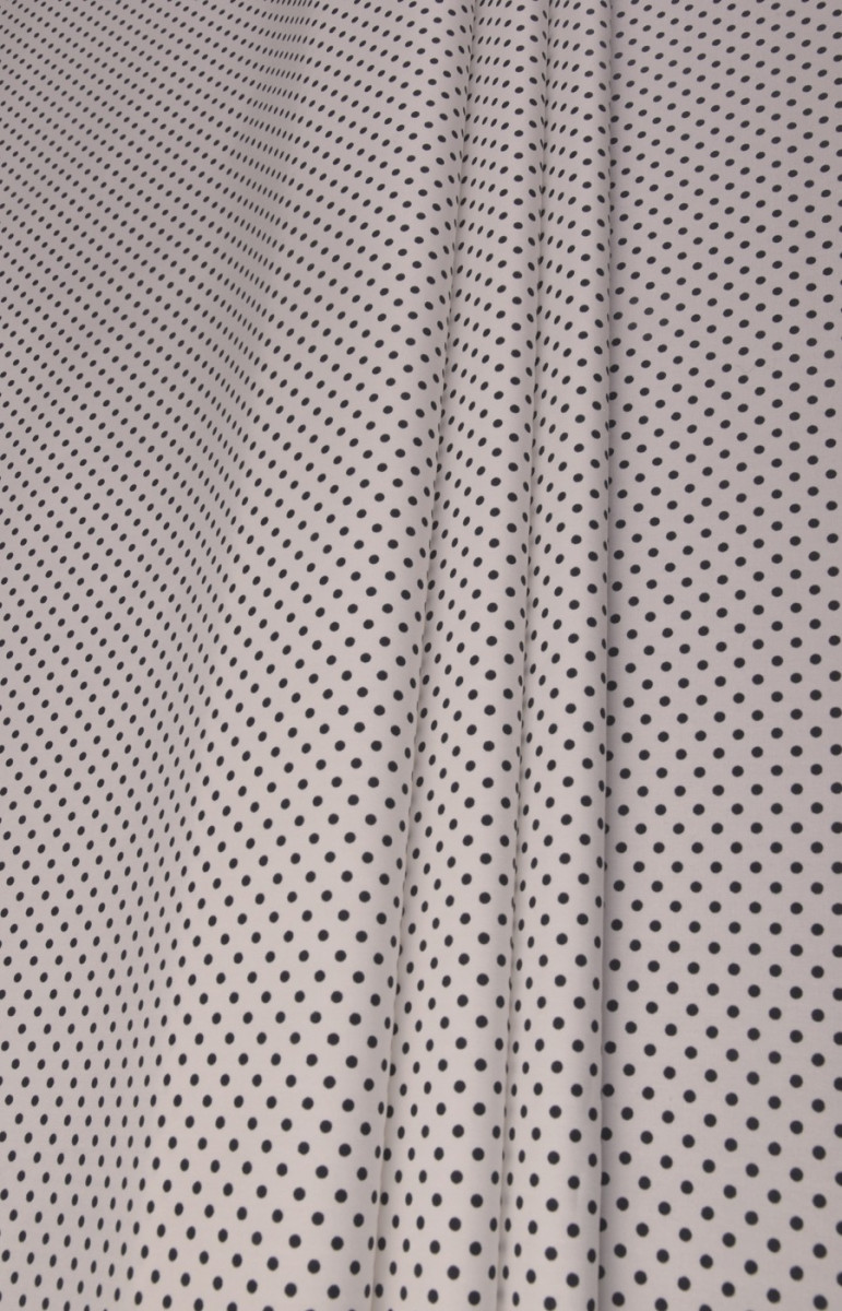 Cotone con pois bianchi e neri