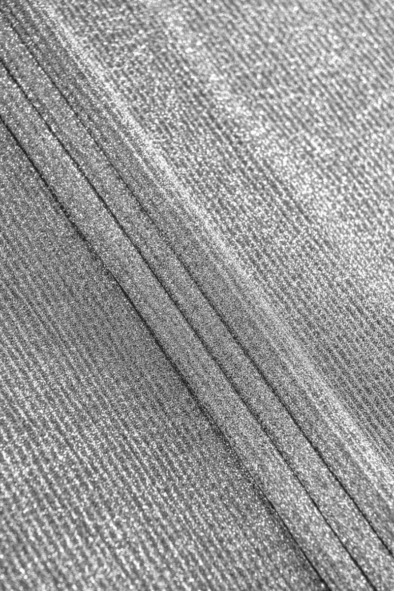 Knitted fabric with lurex...