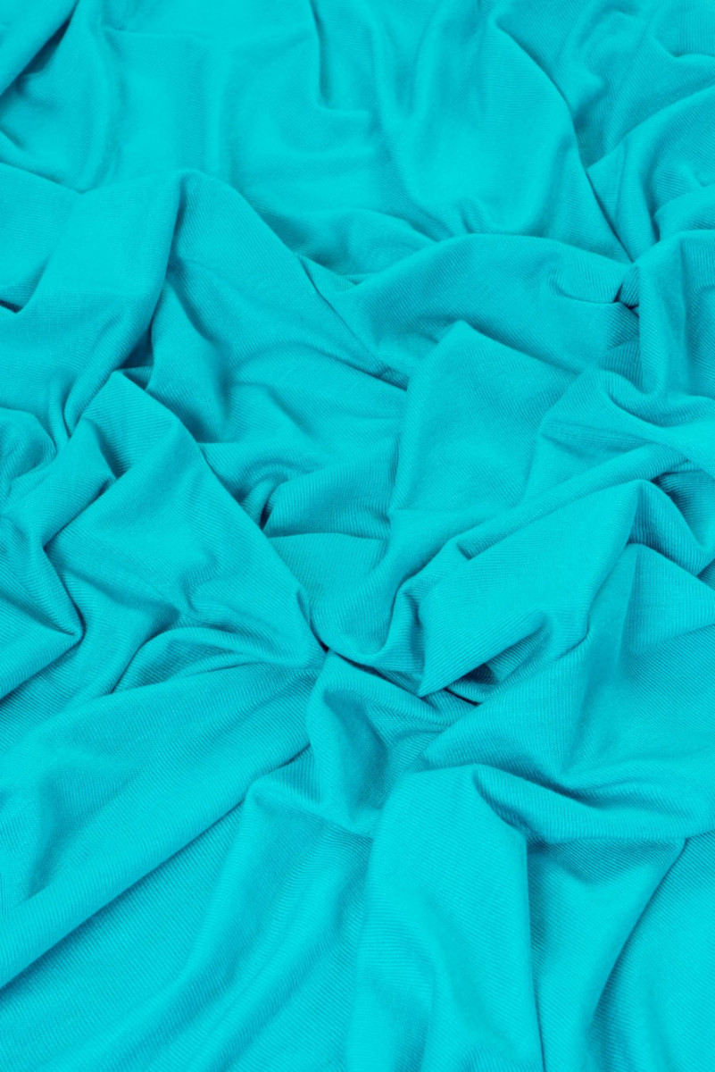 Бірюзовий светр трикотажної в'язки