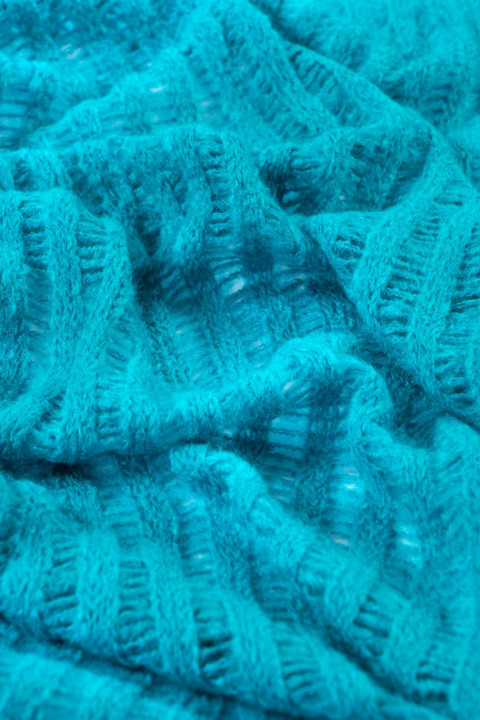 Durchbrochener Pullover-Stoff