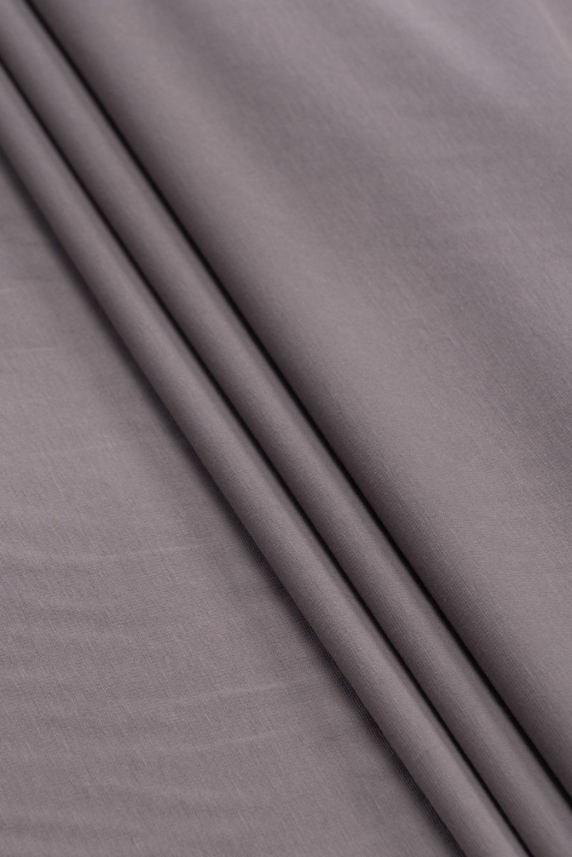 Tissu tricoté gris pierre