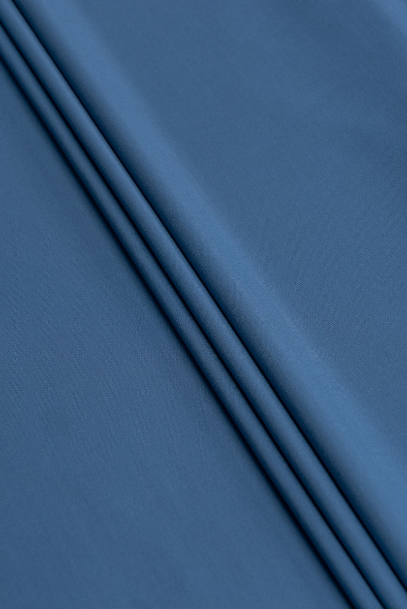 Modrý žerzejový materiál