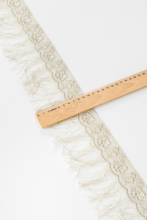 Guiur tape with beige-silver tassels
