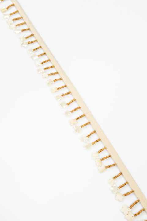 Klebeband mit Holzperlen