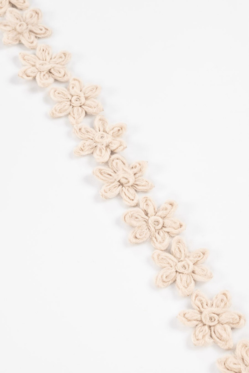 Wol bloem beige kleine allicatie