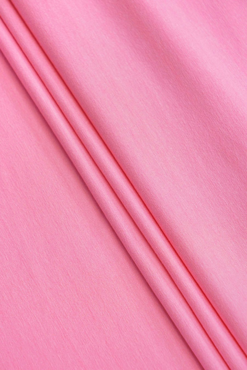 Tissu tricoté en viscose rose clair
