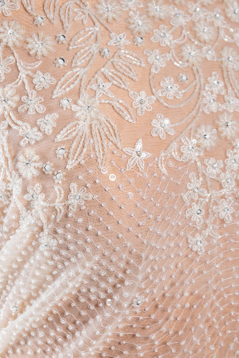 Wedding appliessing - corset densely decorated with flowers