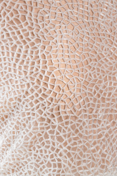 Applicazione corsetto - rete di perline