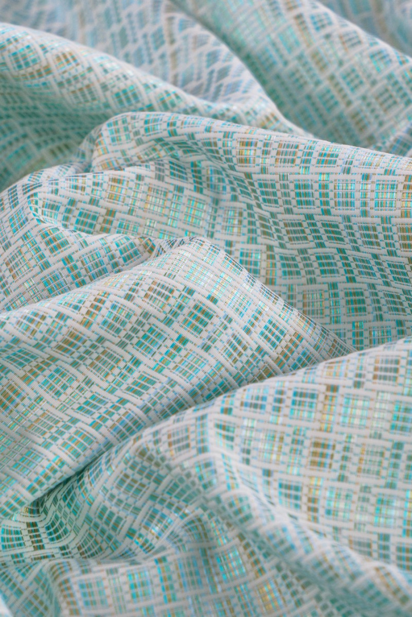 Fehér és türkiz jacquard