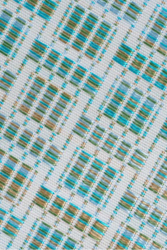 Fehér és türkiz jacquard