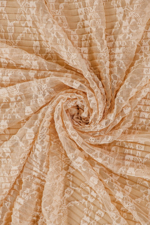 Geplooid kant beige