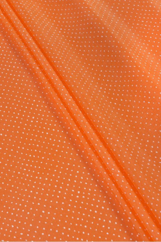 Oranje batist met stippen