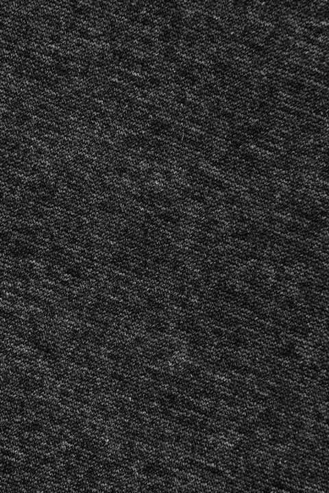 Tejido de punto jersey negro jaspeado