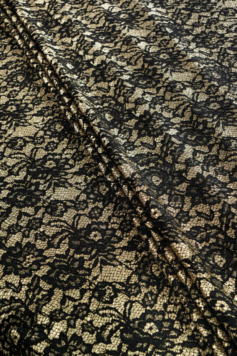 Тканина з блискітками з мереживом золотисто-чорного кольору