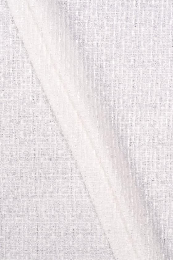 Krämfärgat chanel-tyg