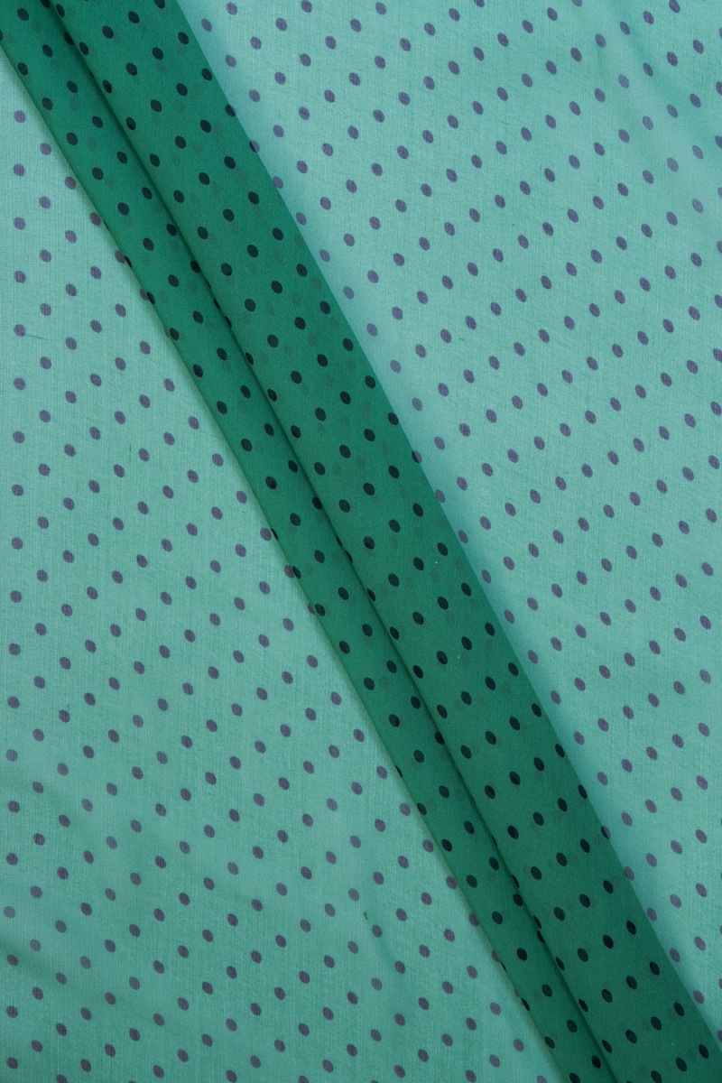 Muslin silk green with polka dots