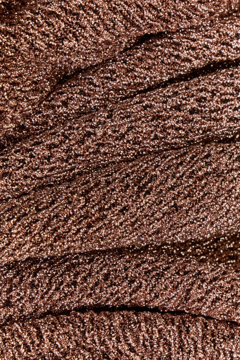Shiny gold knitwear