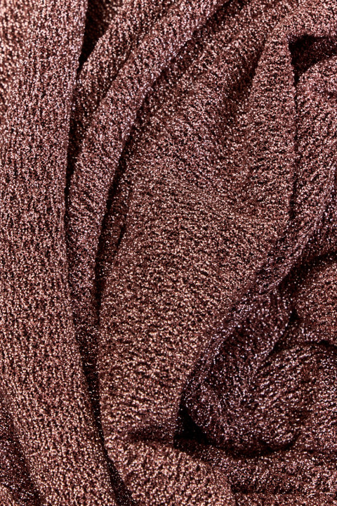 Tissu tricoté cuivré avec une goutte de rose brillant