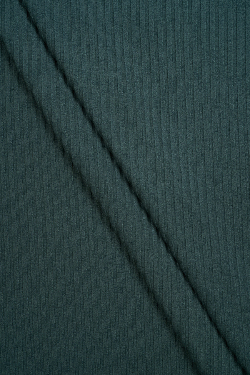 Green ribbed knit fabric