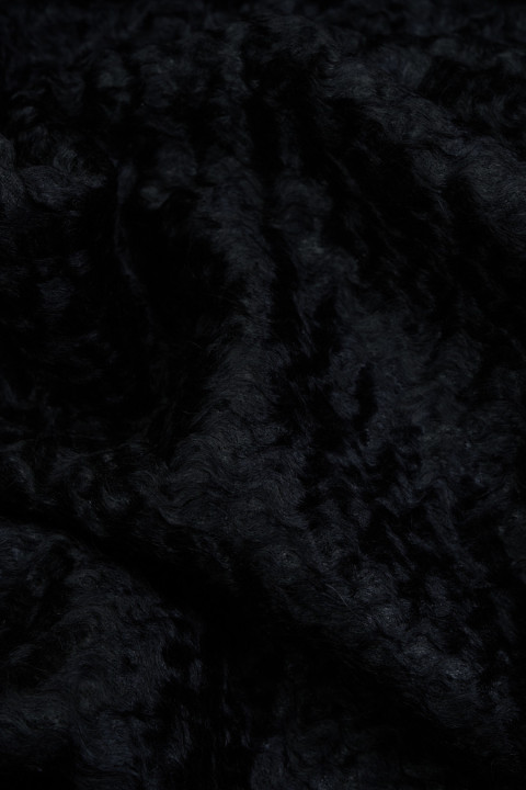 Black caracul coat fabric