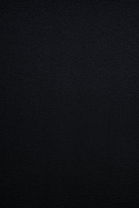 Black caracul coat fabric