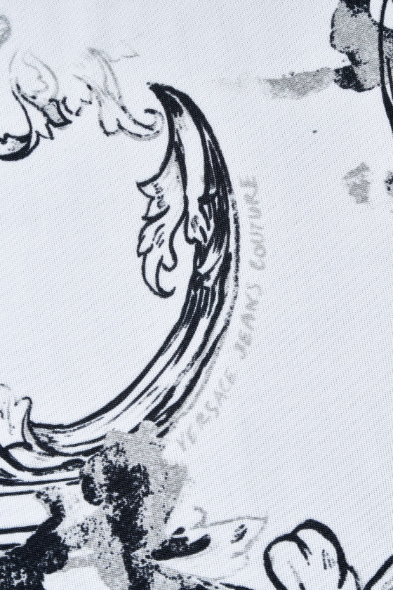Tessuto a maglia bianco con ornamenti neri