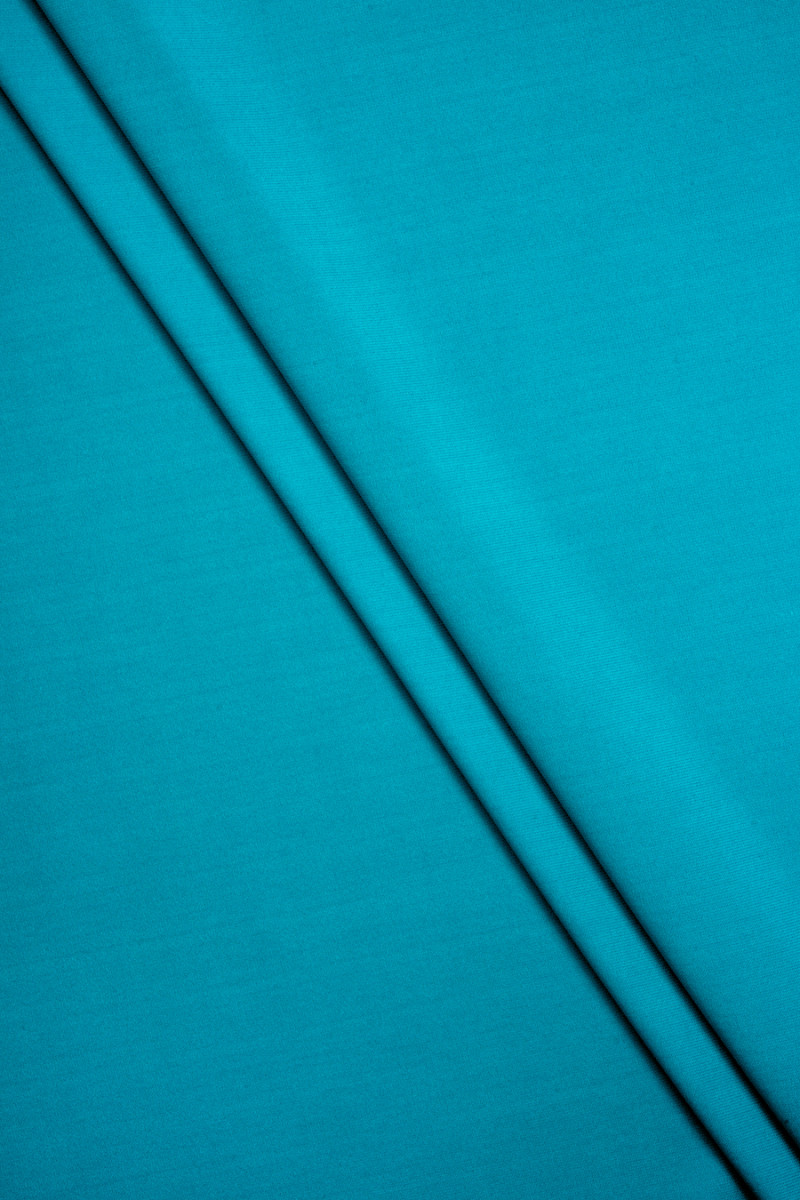 Tissu tricoté turquoise