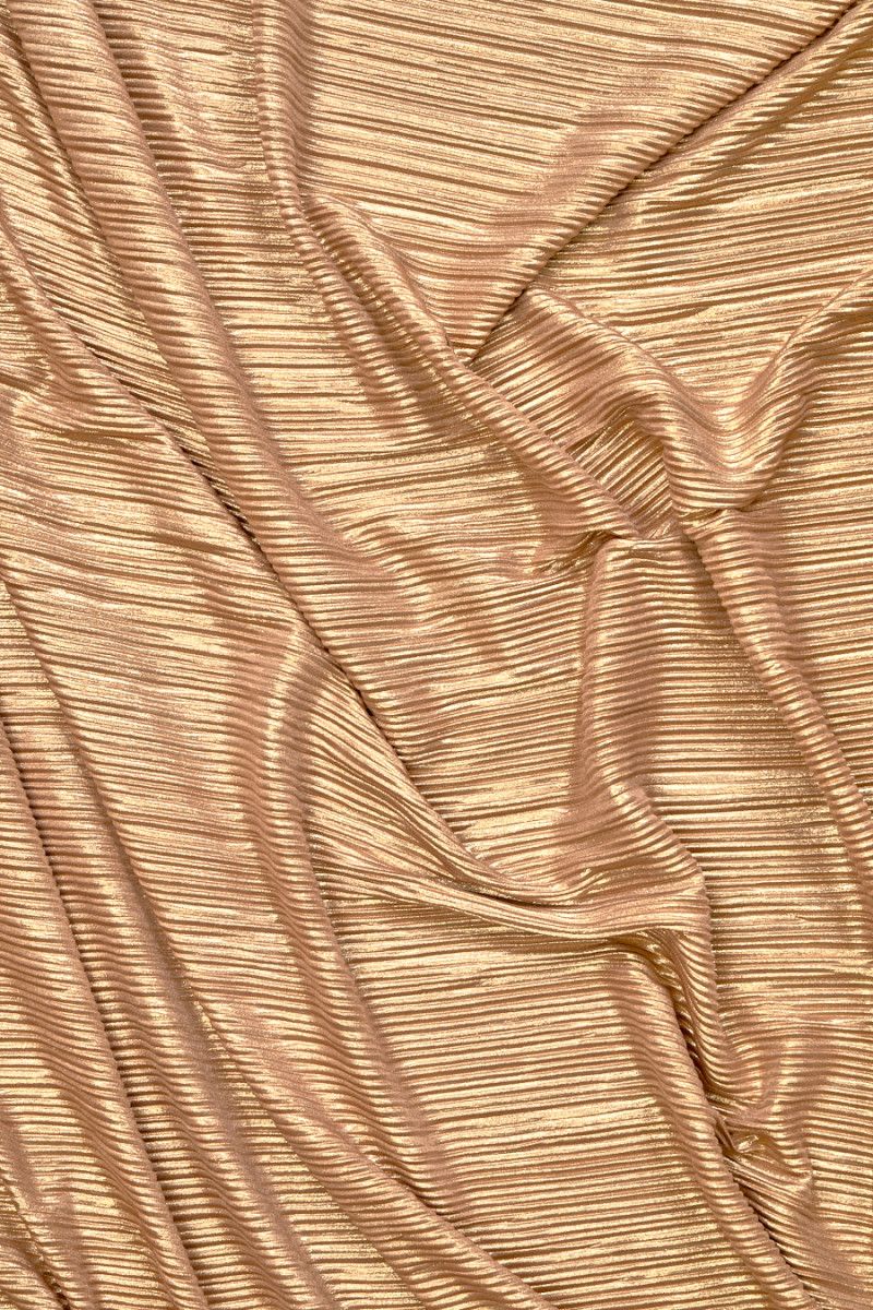 Tessuto plissettato caramello oro