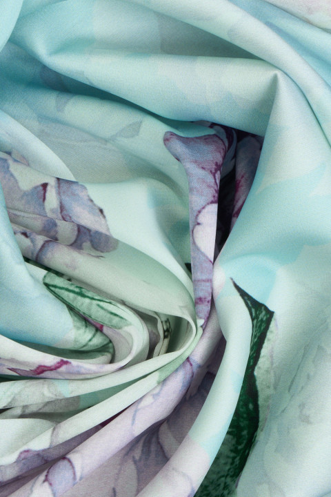 Polyester satin in turquoise peonies