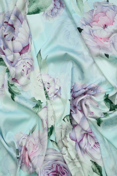 Polyester satin in turquoise peonies