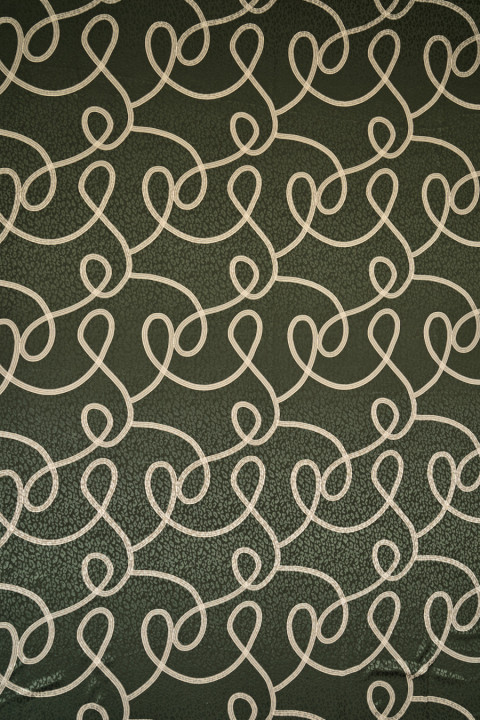 Ribbon and panther jacquard fabric