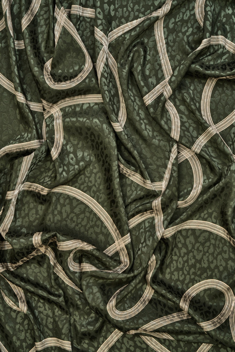 Ribbon and panther jacquard fabric