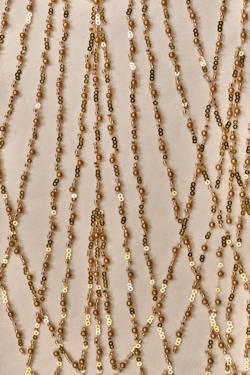 Gold tulle with pearls and sequins