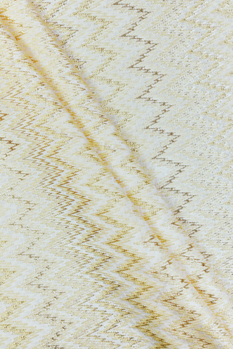 Jacquard gouden zigzaglijnen