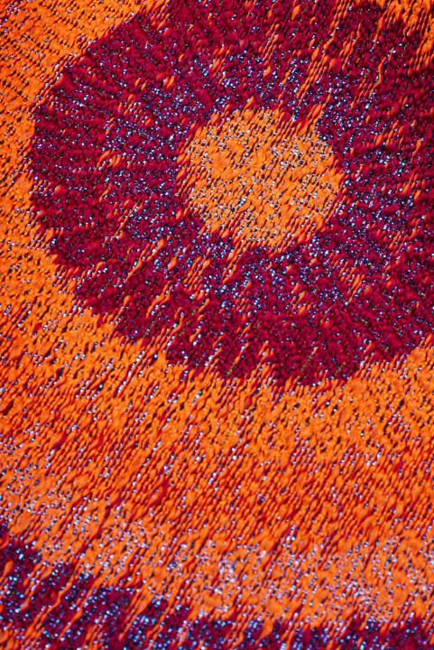 Jacquard orange rosettes