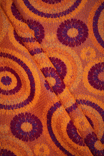 Jacquard orange rosettes