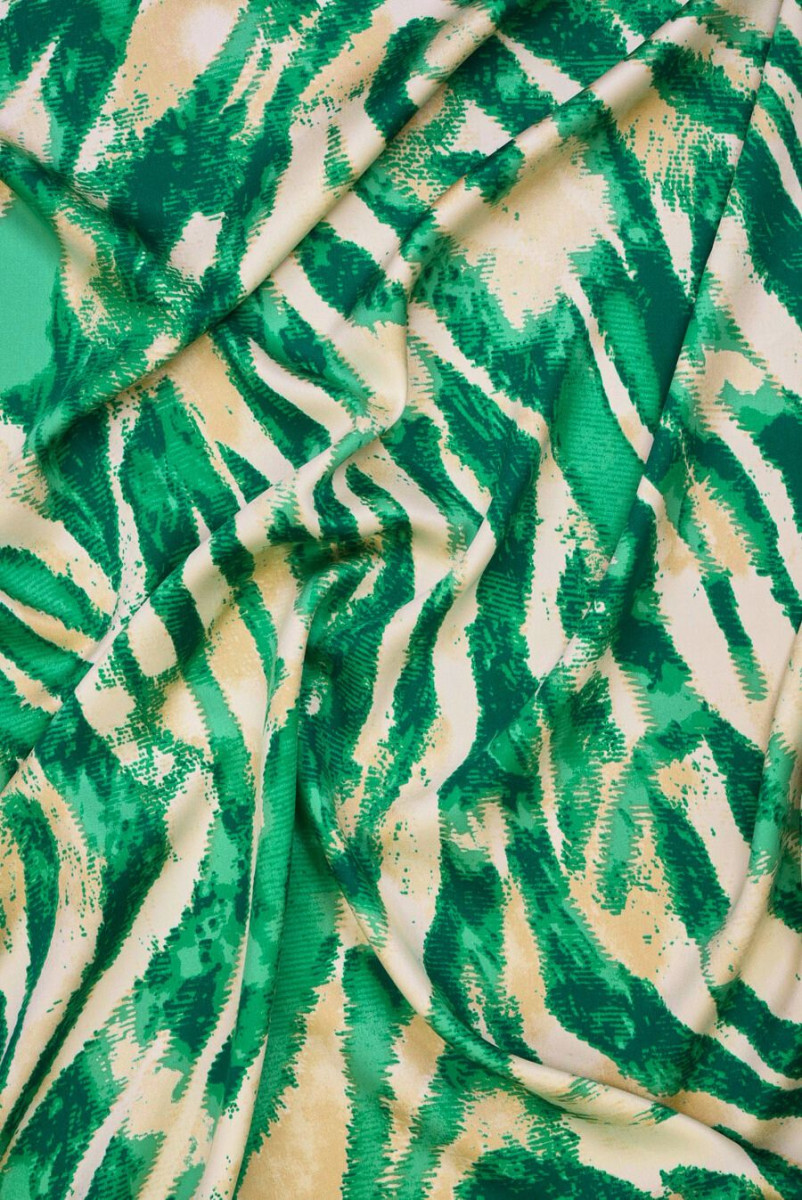Beige viscose with green patterns