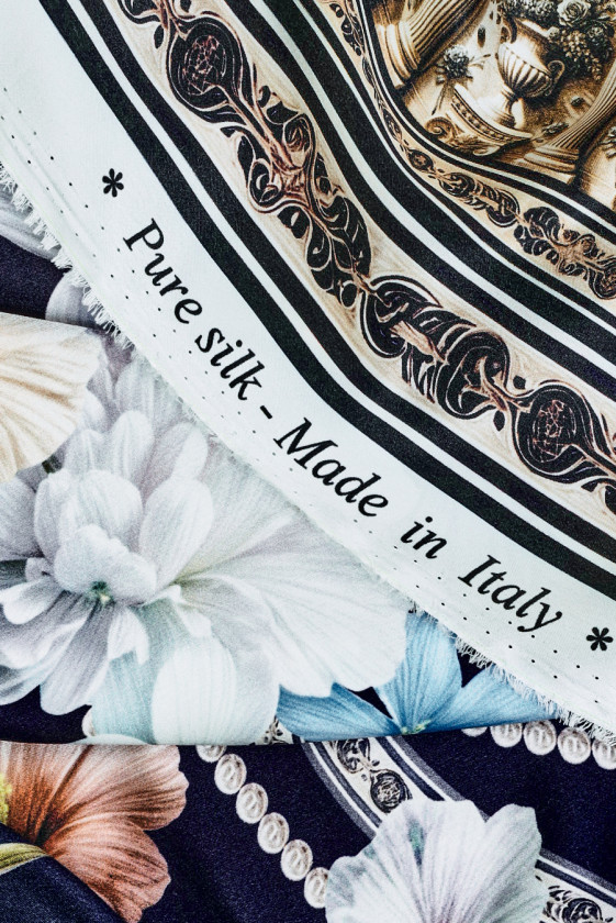 Floral silk satin with a navy blue border