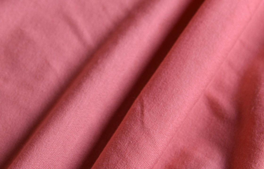 Koraal viscose gebreide stof