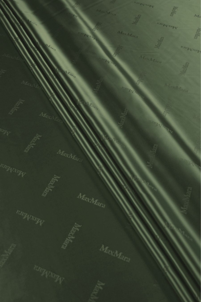 Charakteristisches grünes Innenfutter der Flasche