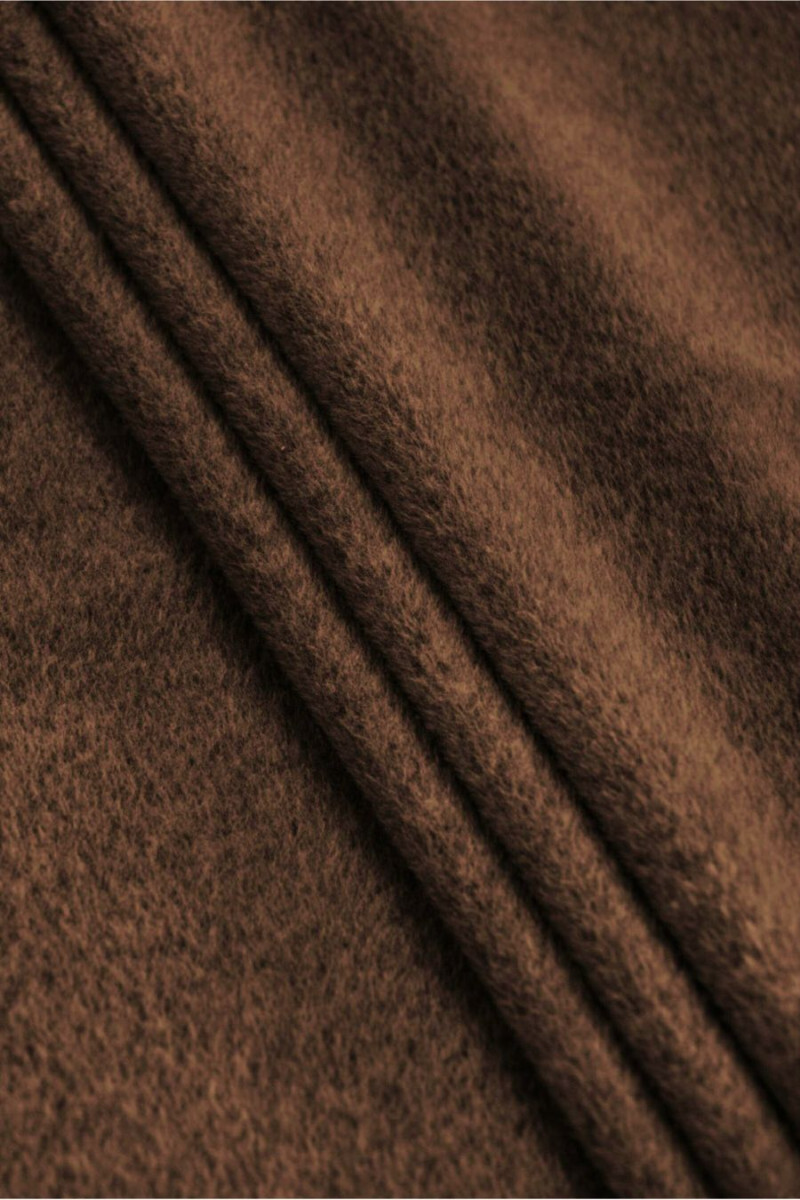 Coated alpaca with brown wool