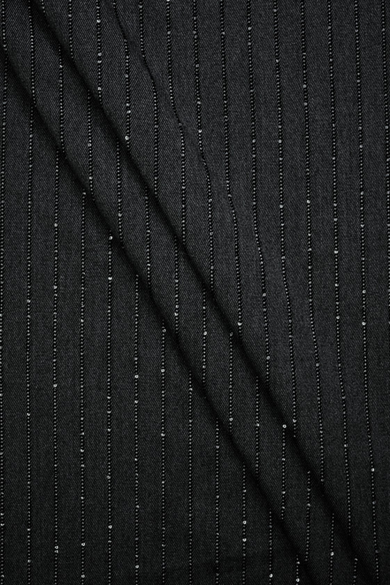 Material de costum cu seilete din grafit