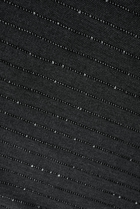 Material de costum cu seilete din grafit