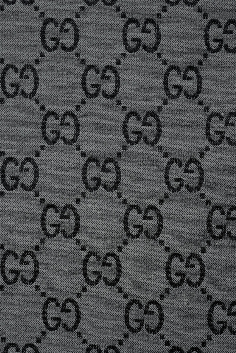 Gesigneerd grijs katoen