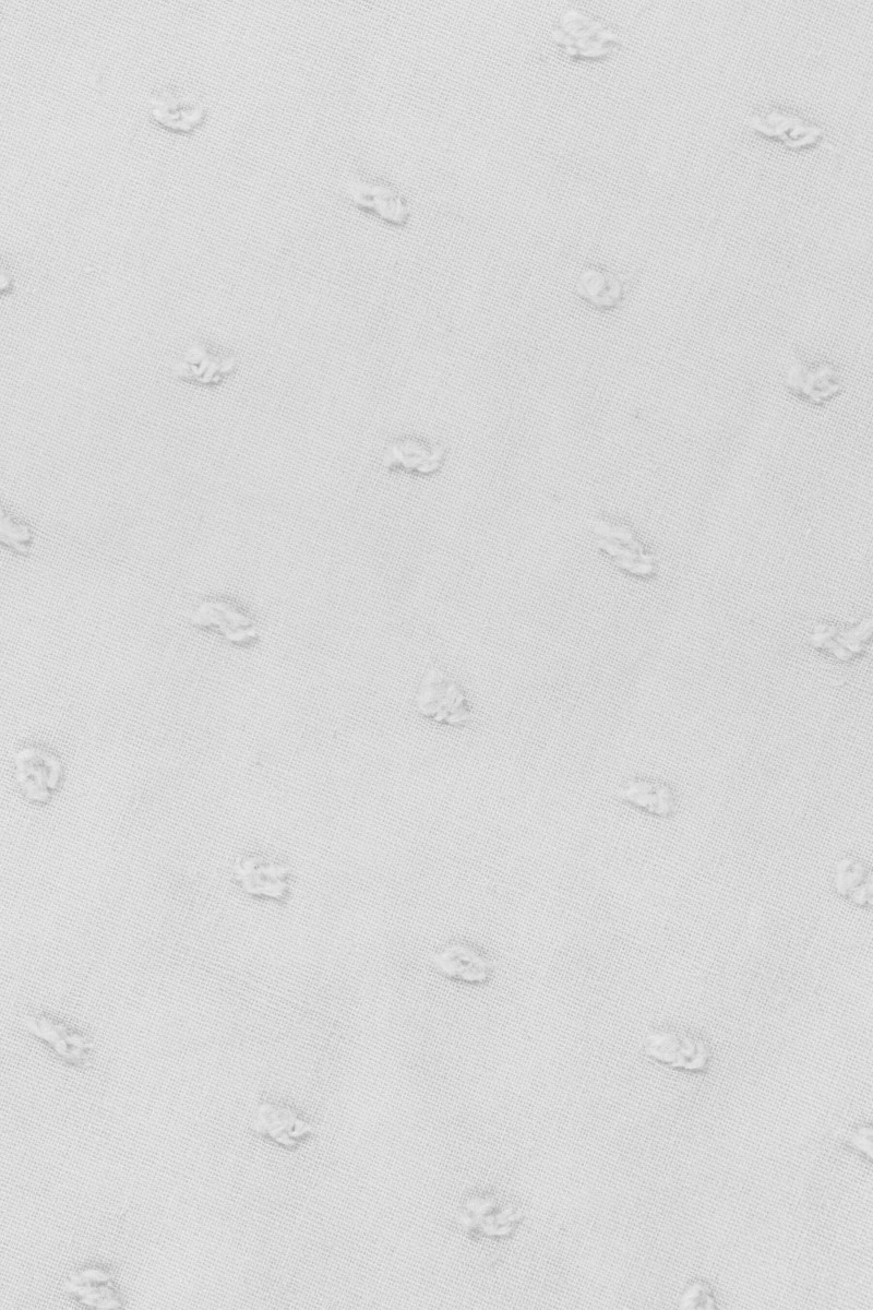 Batiste en « nœud » blanc