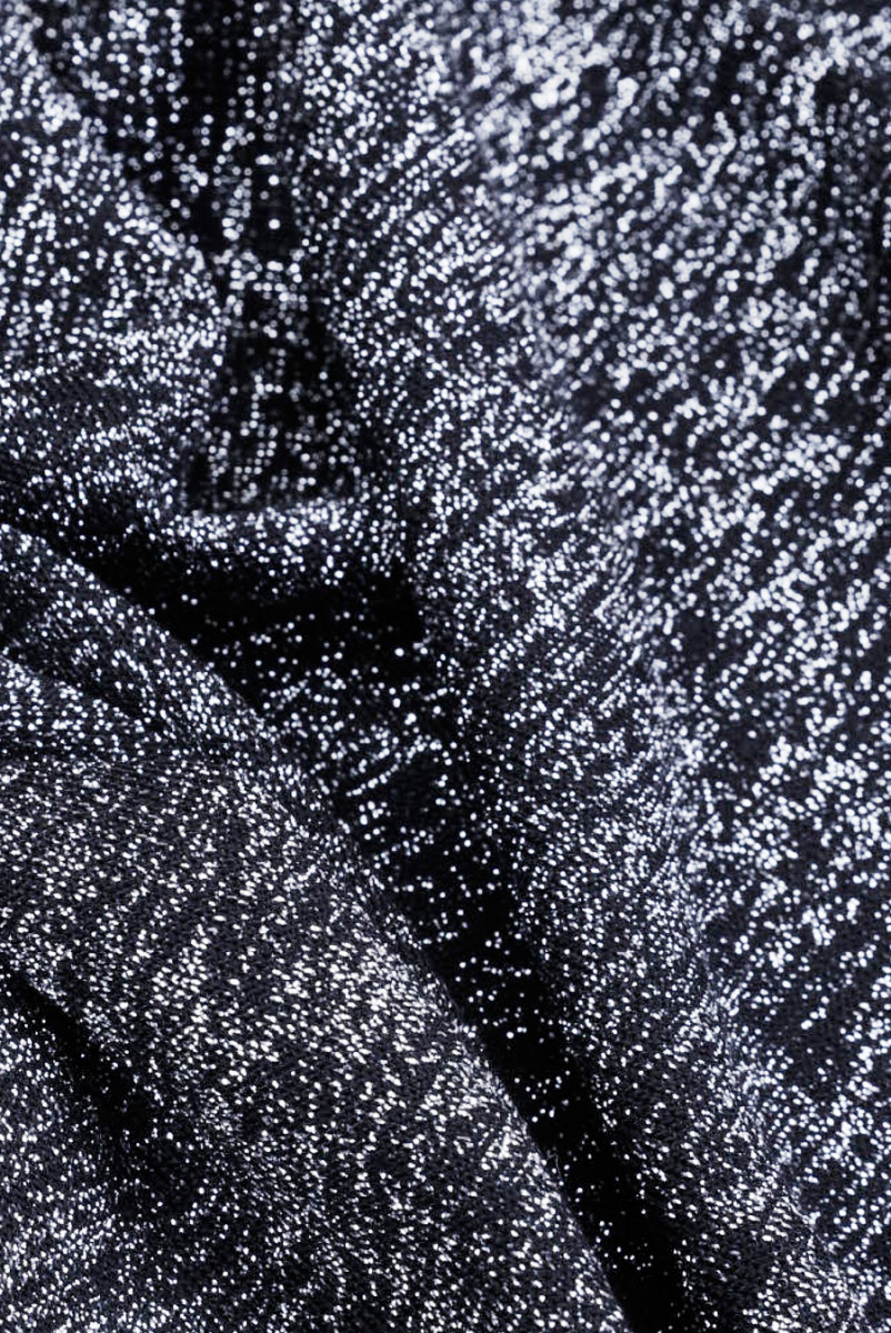 Tissu noir brillant en tricot