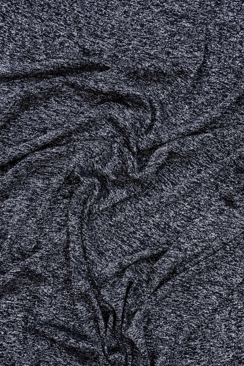 Glossy black knitted fabric