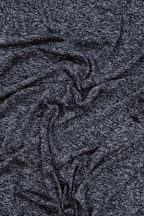 Glossy black knitted fabric