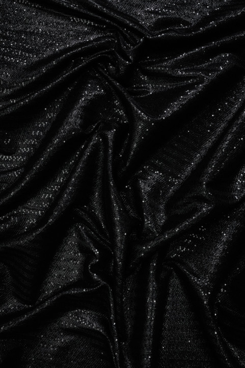 Algodón negro con lentejuelas