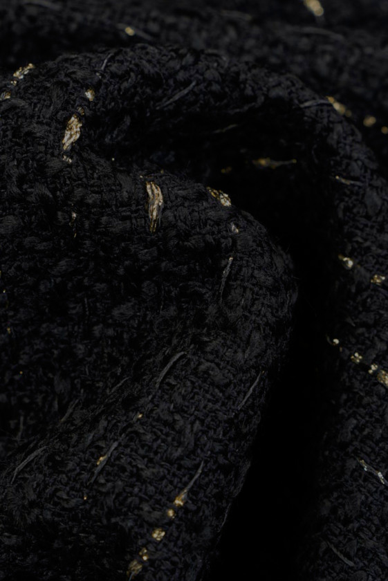 Tessuto Chanel nero con oro
